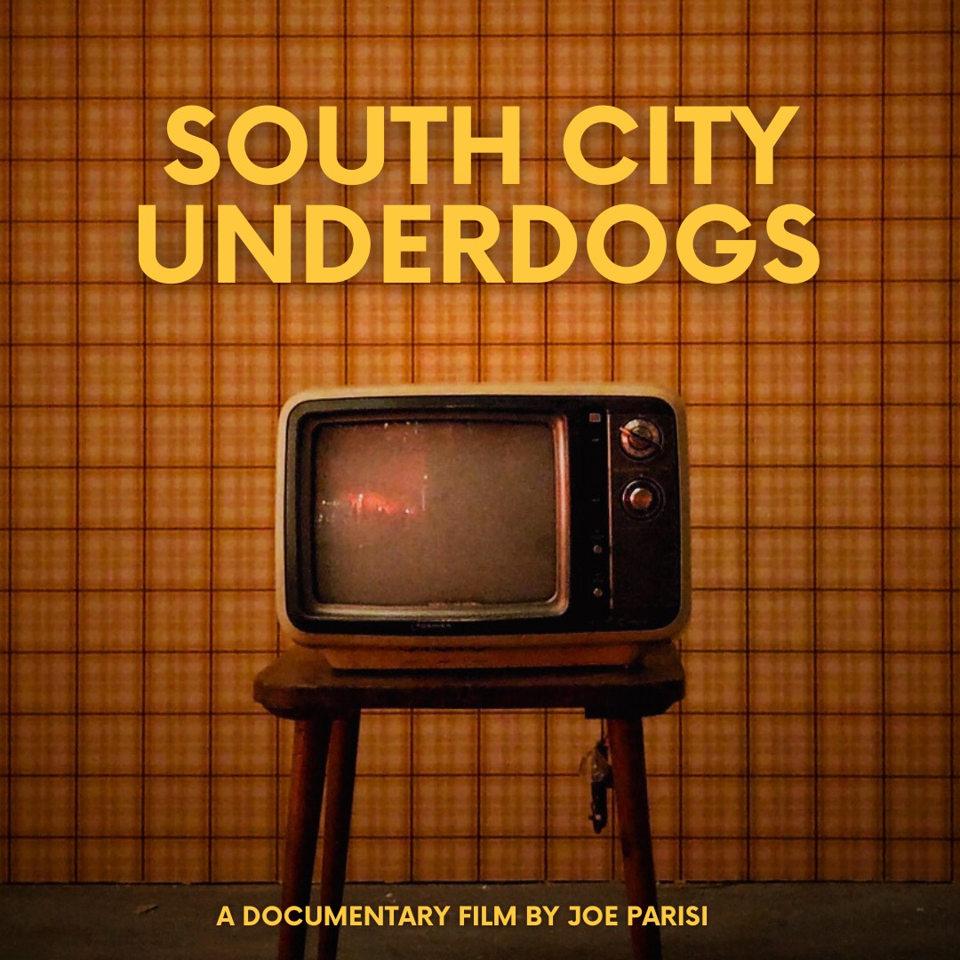 Old television on a wooden stand against a checkered wall background, with text about South City Underdogs documentary.