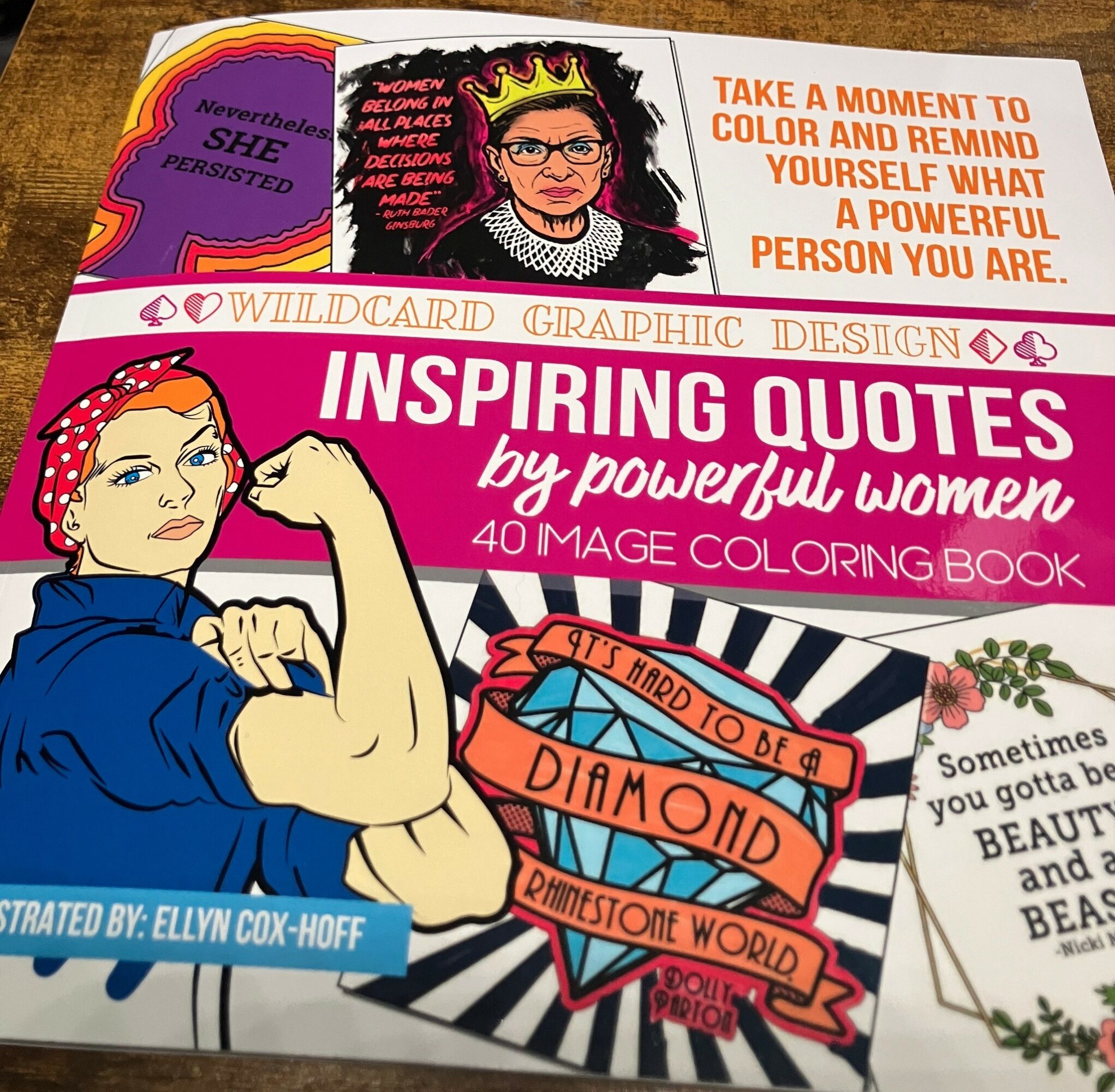 Colorful book covers with empowering quotes and illustrations of women, including a woman flexing her arm and a woman with glasses.