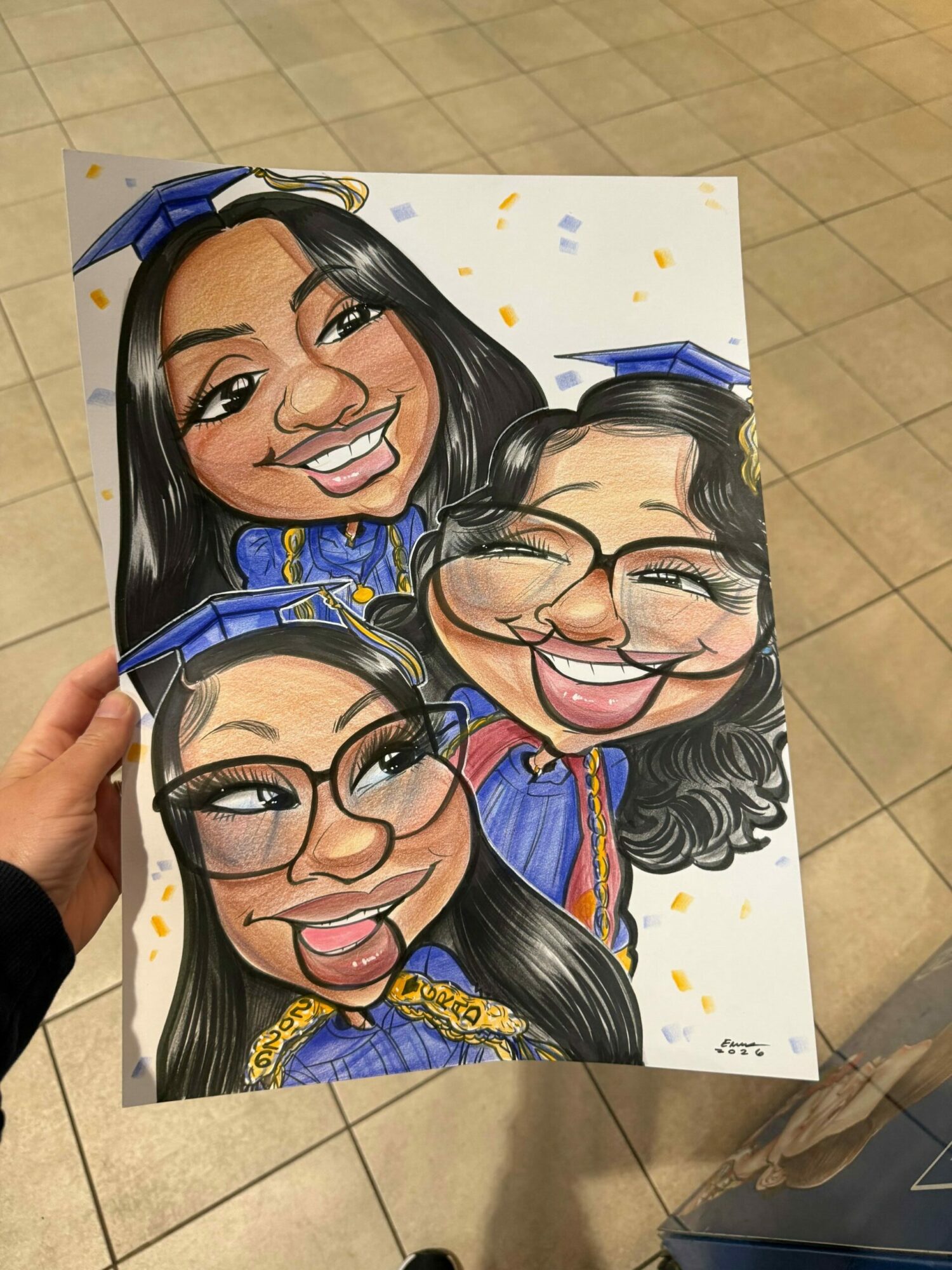 Caricature of three women with glasses, smiling, wearing graduation caps and gowns, celebrating graduation.