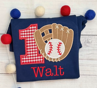 Dark blue fabric with a baseball glove, ball, and the number one with red and white checkered pattern, and the name Walt embroidered.