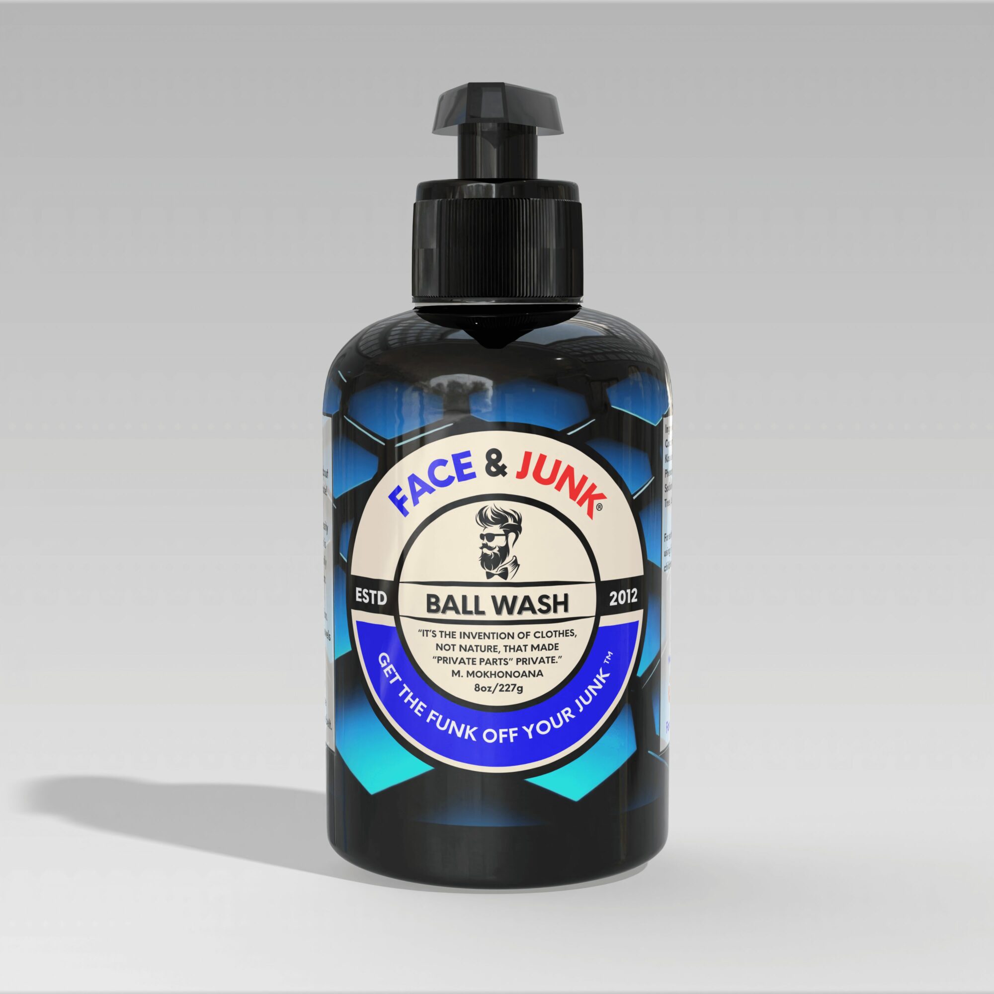 Black bottle with pump dispenser labeled 'Face & Junk Ball Wash' and a blue and white label, standing on a gray surface.