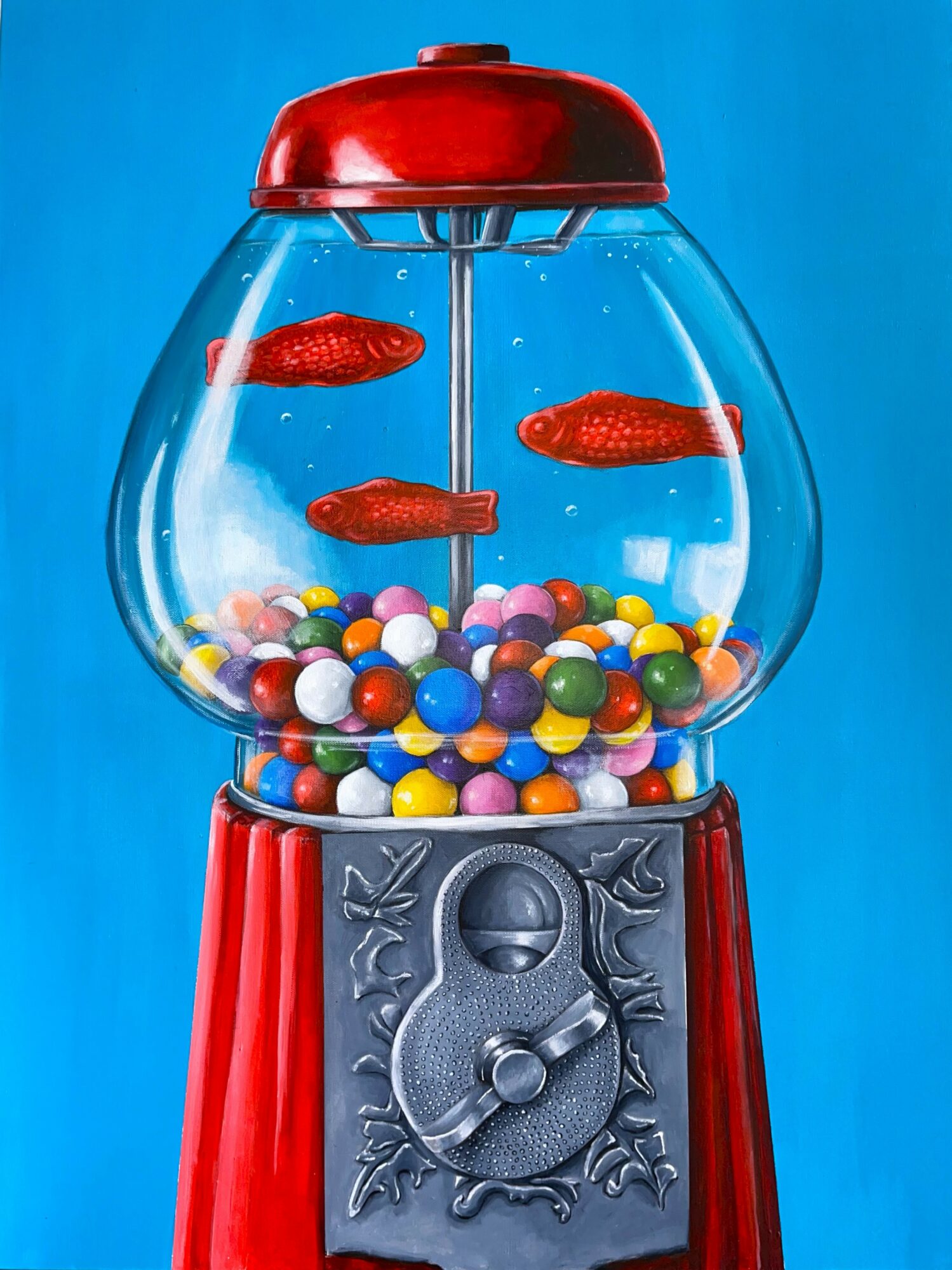 Red gumball machine with colorful gumballs and three fish inside, set against a blue background.