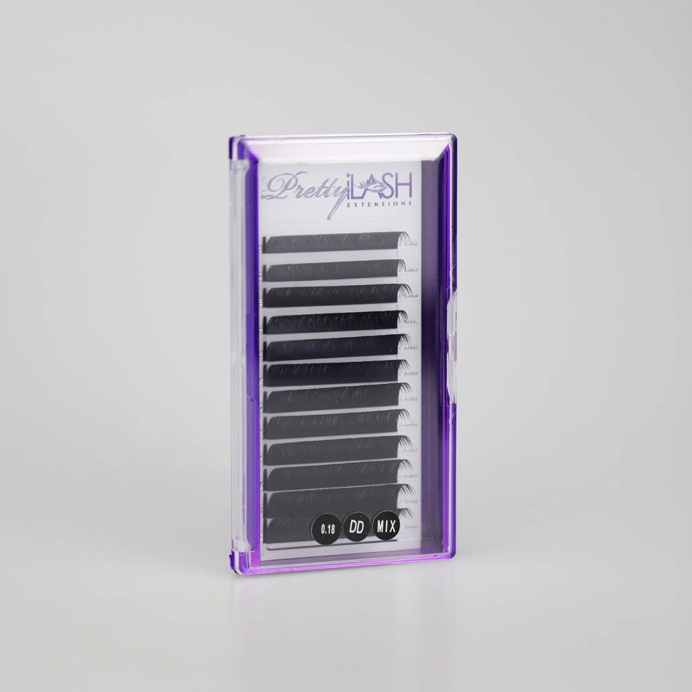 Purple and clear eyelash extension tray with labeled sections and small containers at the bottom, on a light background.