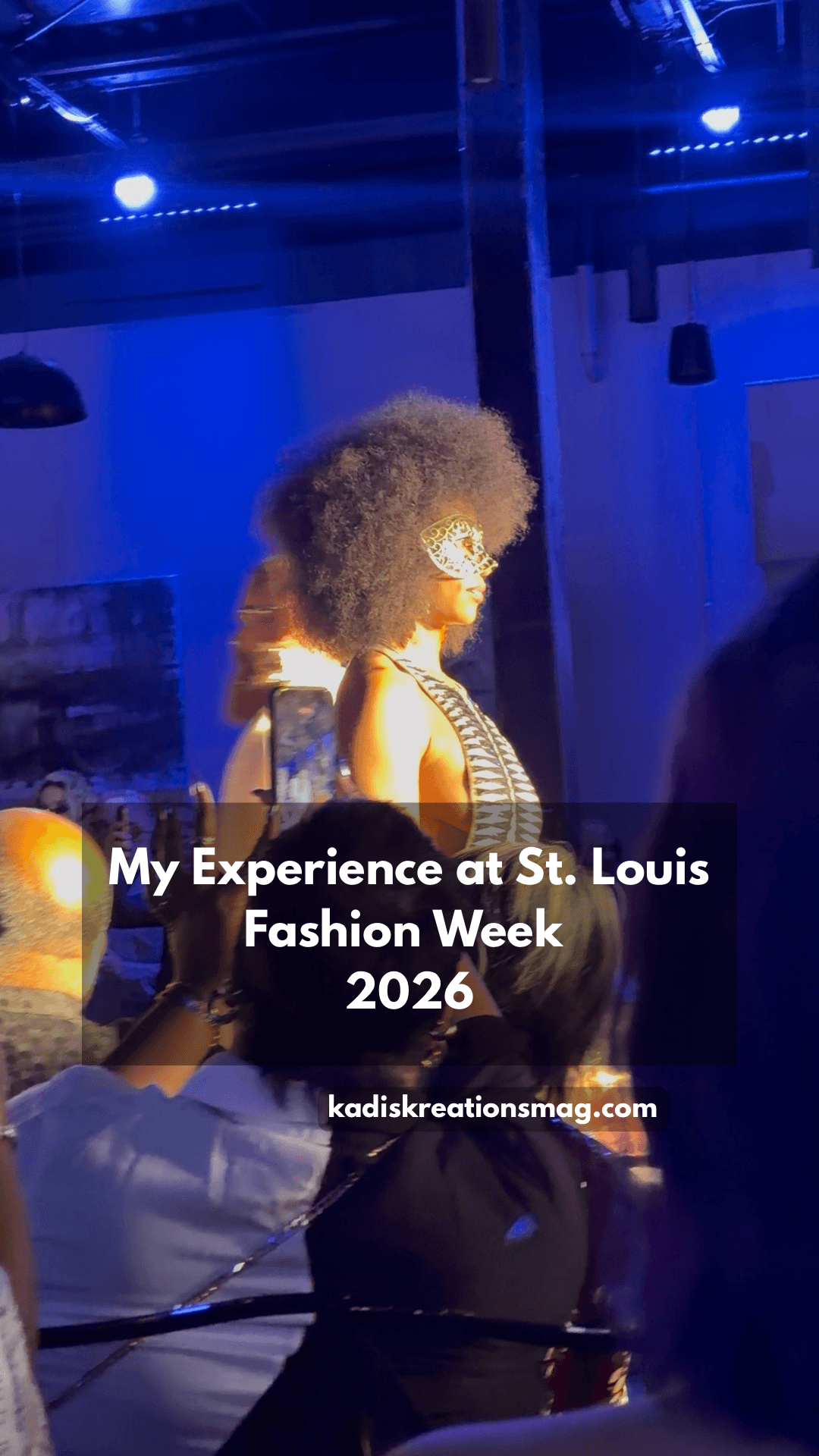 Person with curly hair on stage at night during fashion event, blue lighting, audience in foreground, text overlay about St. Louis Fashion Week 2026.