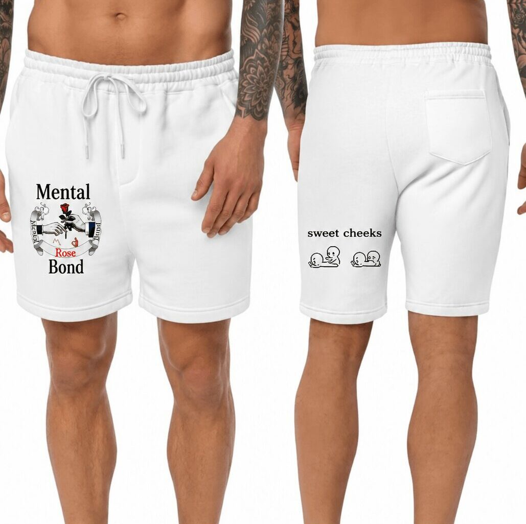 Two men wear white shorts with printed text and graphics on the front and back, standing side by side, facing different directions.